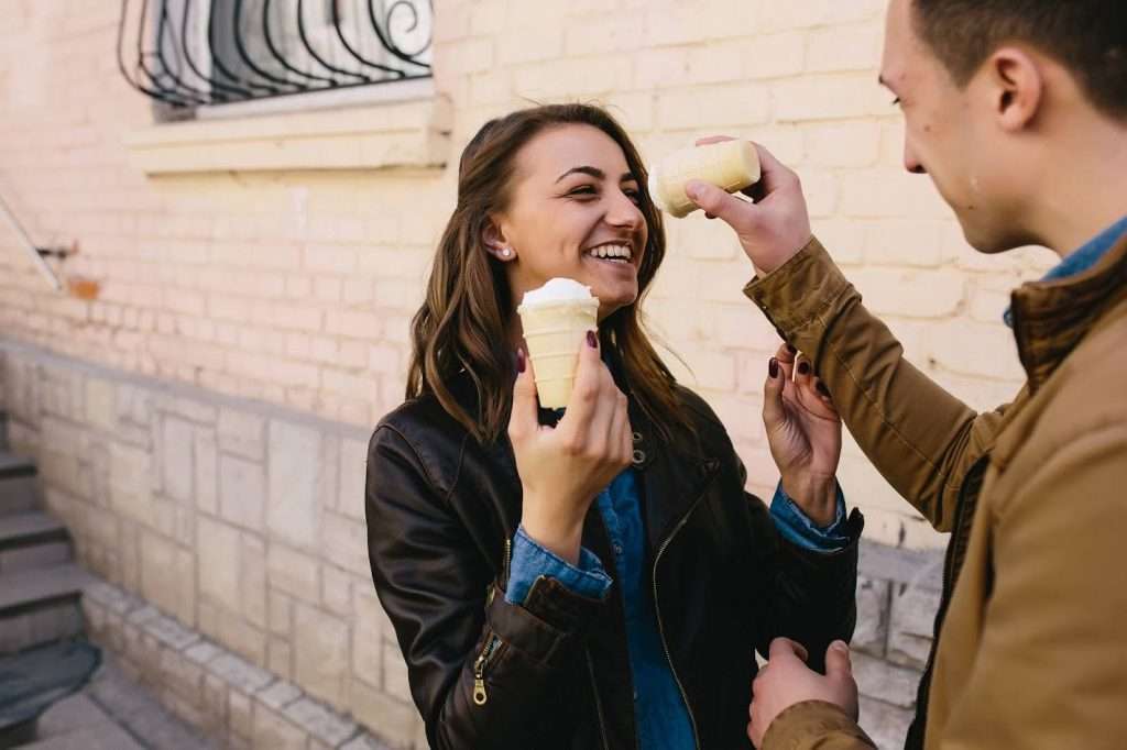 Couple laughing together on a casual daytime date