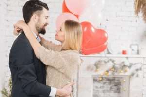 A young couple in love hugging