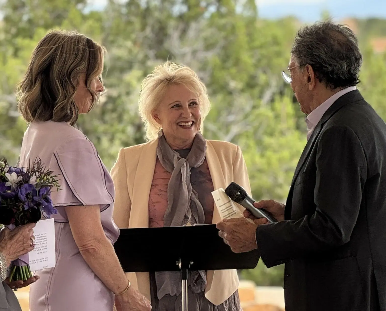 Annie and Mark at their wedding ceremony with matchmaker Julie Ferman